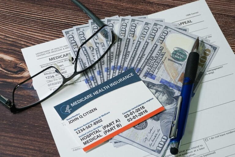 Medicare card, money and forms.